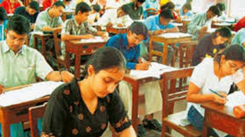 There will be a three-hour exam which includes three sections - physics, chemistry and biology.  (Representational Images)