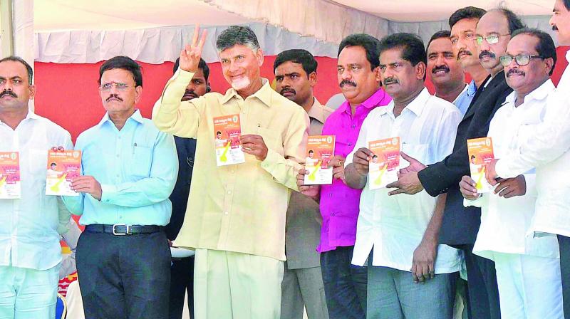 Chief Minister N. Chandrababu Naidu, Speaker Kodela Sivaprasada Rao, Collector B. Lakshmikantham and NGO leaders release book at the Nava Nirmana Deeksha programme at Benz circle centre in Vijayawada on Friday.