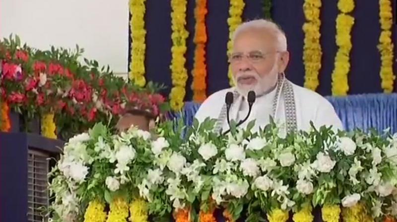 The prime minister arrived in Gujarat on Thursday morning on a days visit and headed to Valsad. He will launch some more projects later in the day in Junagadh. (Photo: ANI/Twitter)