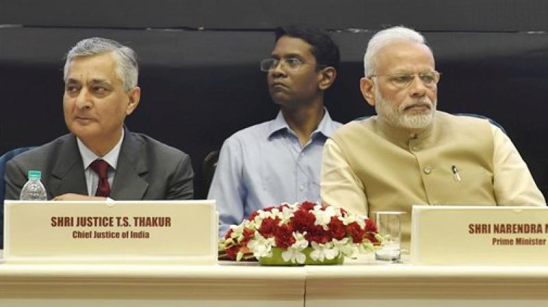 Prime Minister Narendra Modi and Chief Justice of India, T.S. Thakur. (Photo: PTI)