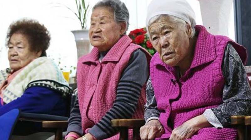 Former South Korean sex slaves, who were forced to serve for the Japanese Army during World War II, wait for results of a meeting of South Korean and Japanese foreign ministers at the Nanumui Jip, The House of Sharing, in Gwangju, South Korea. (Photo: AP)