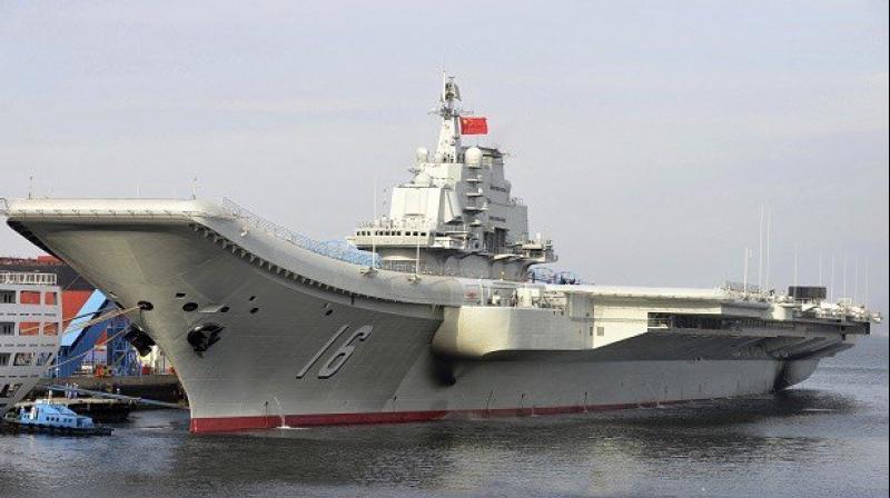 In this file photo, Chinas aircraft carrier Liaoning berths in a port of China. (Photo: AP)
