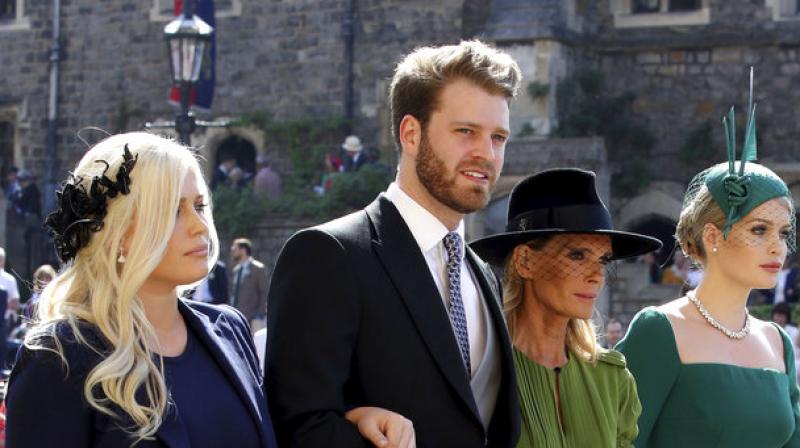 From left, Eliza Spencer, Louis Spencer, Victoria Aitken and Kitty Spencer arrive for the wedding ceremony of Prince Harry and Meghan Markle at St. Georges Chapel in Windsor Castle in Windsor. (Photo: AP)