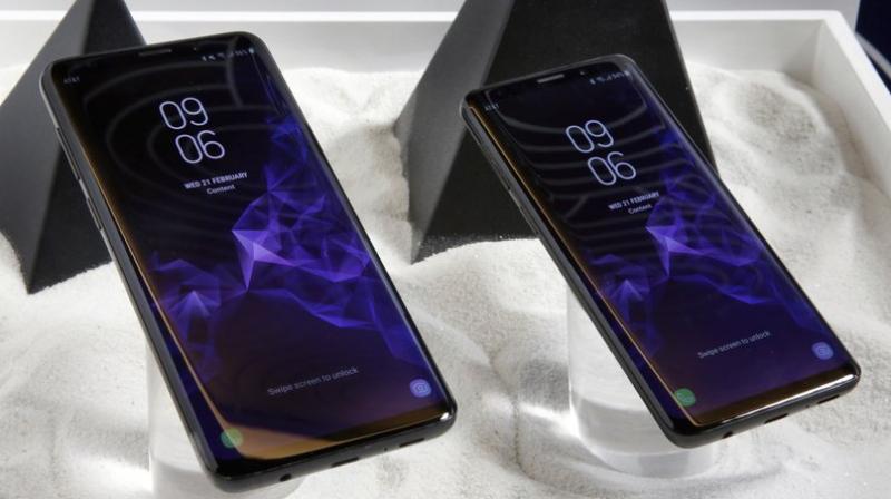 Photo shows the Samsung Galaxy S9 Plus, left, and Galaxy S9 mobile phones are shown in this photo during a product preview in New York. The Galaxy S9 phones were unveiled Sunday, Feb. 25, in Barcelona, Spain, and will be available March 16. Advance orders begin this Friday. (AP Photo/Richard Drew)