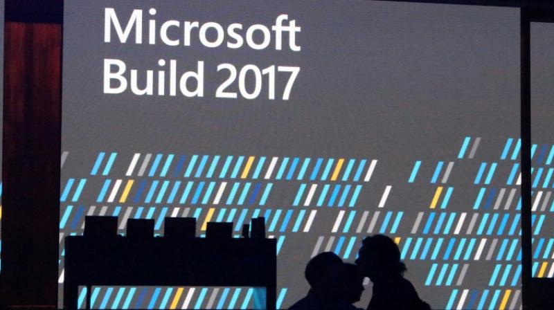 This image shows the stage of the Microsoft Build developers conference in Seattle, Washington on May 11, 2017, where the tech giant unveiled new hardware for \mixed reality\ computing (Photo: AFP)