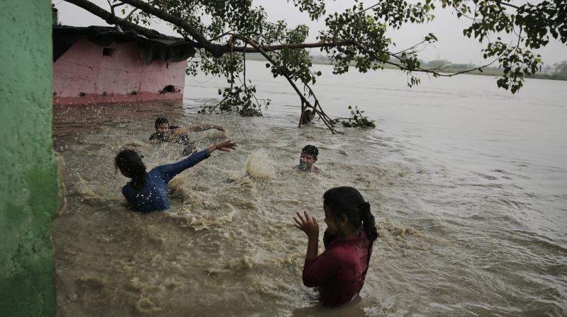 Several households in low-lying areas have been evacuated after the River Yamuna crossed the danger mark. (Photo: AP)