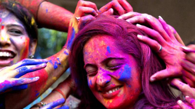 While playing Holi avoid sitting under the sun with the colour still on your skin as it makes it more difficult to get rid of.