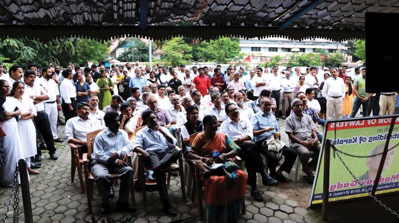 A large number of people turned out to listen to Madhav Gadgils talk. People failed to get places inside the hall seen listening to the speech from outside through television projection. (Photo:DC)