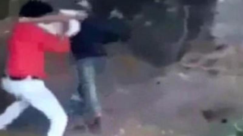 The video showed a man leading the victim identified as Mohammed Afrazul, to a spot and then attacking him with an axe from behind. (Screengrab from NDTV)