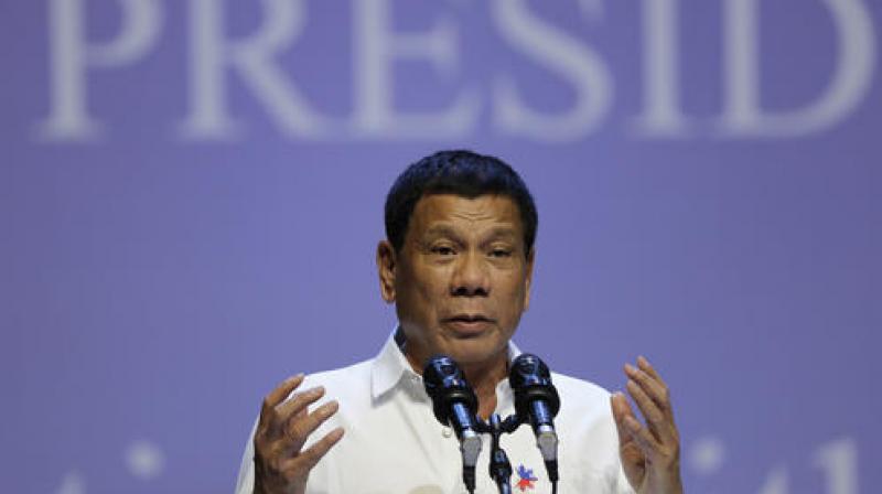 Philippine President Rodrigo Duterte speaks to the Filipino community in Singapore. (Photo: AP)
