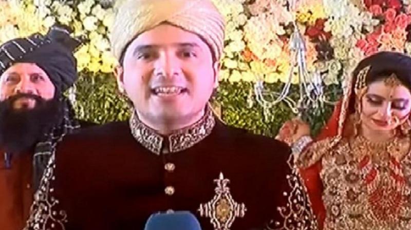 Appearing on-air in his wedding attire, the TV reporter covered the breaking news and interviewed his father, wife, mother-in-law and even his own mother. (Photo: Youtube screengrab)