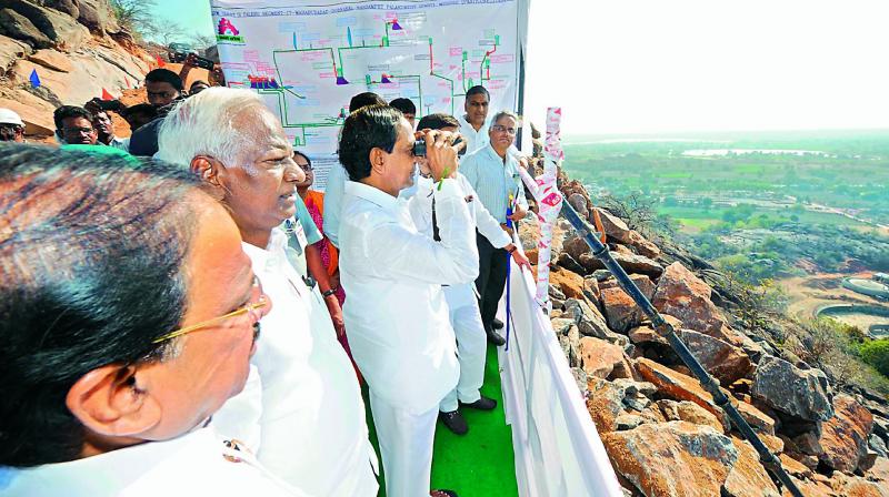 Chief Minister surveys the Bhakta Ramadas Lift Irrigation Scheme after commissioning it in Tirumlayapalem on Tuesday.