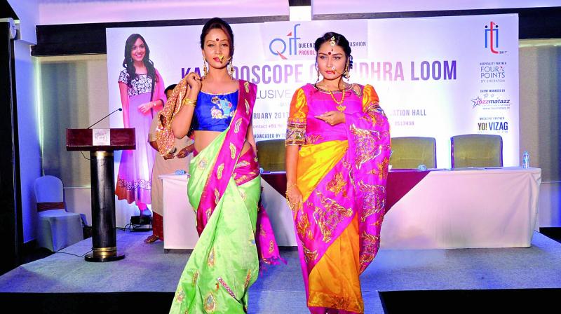 Models display designer-wear saris during a display for the upcoming fashion festival by the students of a Queenz Institute of Fashion Technology in Visakhapatnam on Tuesday. (Photo: DC)