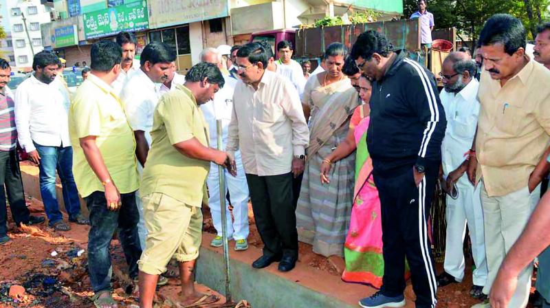 Minister P. Narayana inspects underground drainage works in Nellore city on Tuesday. Mayor Abdul Aziz is also seen. (Photo: DC)