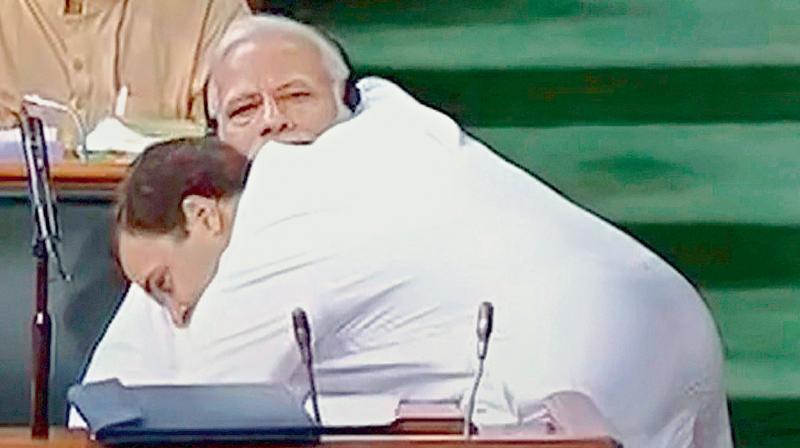 on the house: Congress president Rahul Gandhi was mocked by Prime Minister Narendra Modi for asking him to stand for a hug. Mr Modi said the Congress leader was in a hurry to unseat him.