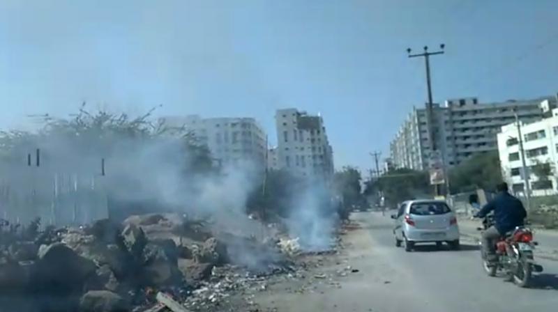 Garbage being burnt at Hasmathpet.