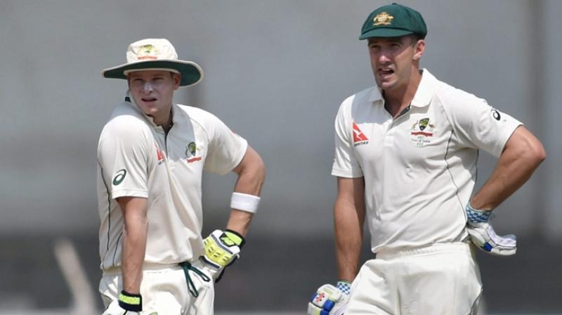 Steve Smith (L) and Shaun Marsh in action against India A in Mumbai. (Photo: PTI)