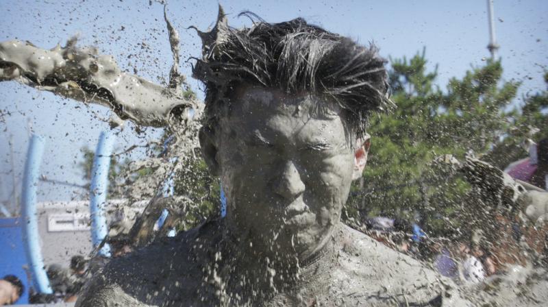 Mud-slinging was never this fun; Boryeong Mud Festival sees revellers go wild