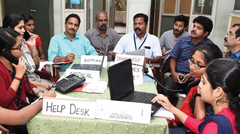 The help desk ready attending calls of people in distress at the Kozhikode Collectorate on Onam day.