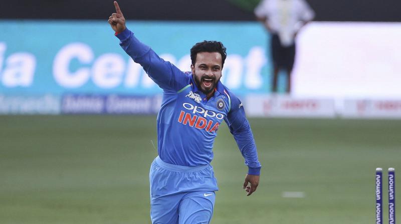 Kedar Jadhavs unique slingshot action makes it difficult for batsmen to pick and with his subtle change of pace and trajectory, the Maharashtra cricketer has proved a useful option for the captain. (Photo: AP)