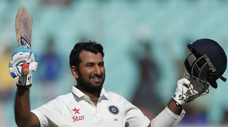 Cheteshwar Pujara brought up his ninth Test hundred as India ended day three of the first Test against England for 319/4. (Photo: AP)