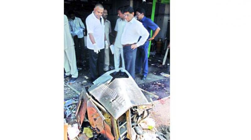 File photo of officials inspecting Gokul Chat site. 	 Image: DC