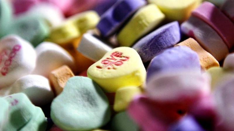 Heart shaped candies with messages. (Photo: AP)