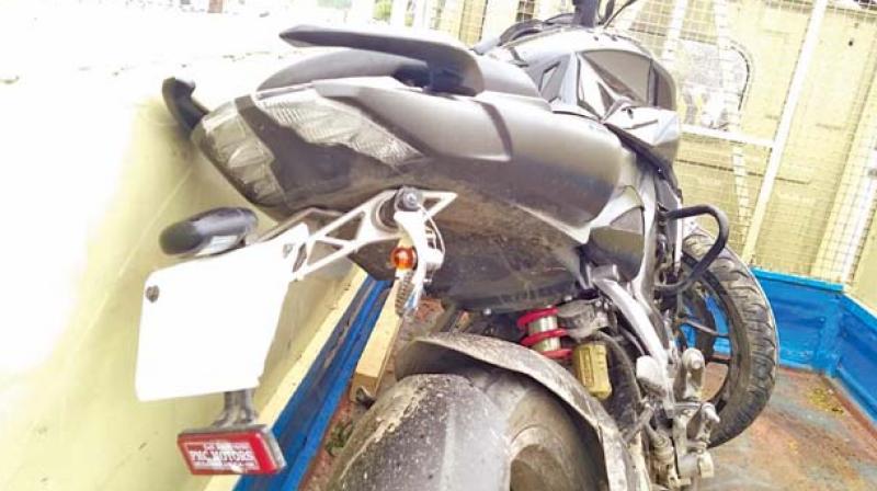 The bike in which the two 16-year-olds were riding from which the cops seized 250gms of ganja.  (Image: DC)