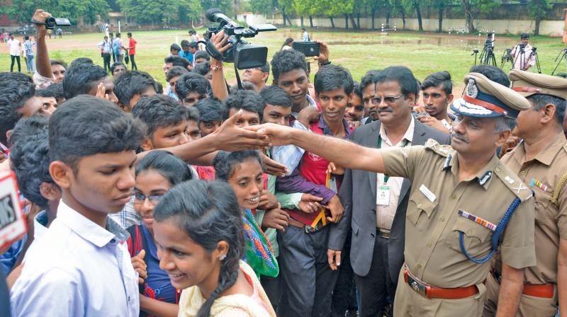 Commissioner of Police A.K Viswanathan interacts with Presidency College students in the college campus on Friday. 	  (Image: DC)