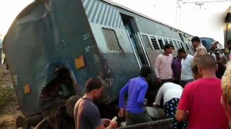 The accident took place 50m from Harchandpur railway station in Raebareli. Several passengers are feared trapped after the derailment. (Photo: Twitter | ANI)