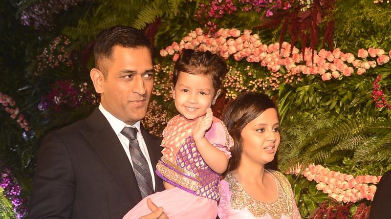 One person who stole the show was Mahendra Singh Dhonis daughter Ziva, who was being carried by his father.(Photo: Viral Bhayani / Deccan Chronicle)