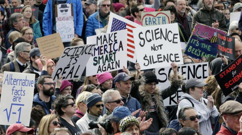 Members of the scientific community, environmental advocates, and supporters demonstrate Sunday, Feb. 19, 2017, in Boston, to call attention to what they say are the increasing threats to science and scientific research under the administration of President Donald Trump. (Photo: AP) Members of the scientific community, environmental advocates, and supporters demonstrate Sunday, Feb. 19, 2017, in Boston, to call attention to what they say are the increasing threats to science and scientific research under the administration of President Donald Trump. (Photo: AP)