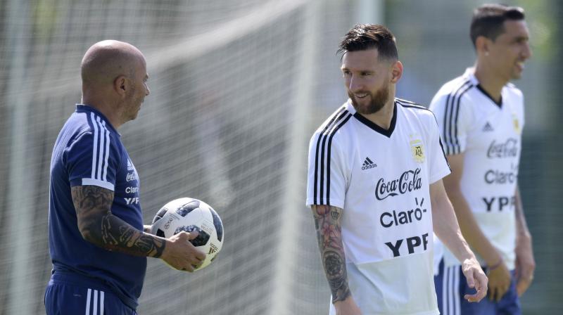 Coach Jorge Sampaoli has called on Argentina to lift their game to the level of \genius\ Lionel Messi when they look to seal a World Cup quarter-final place with victory over France on Saturday. (Photo: AFP)