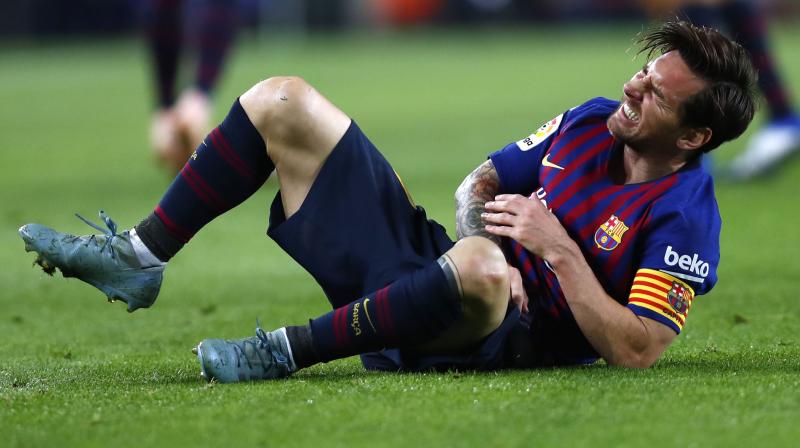 Lionel Messi, who fractured his right arm, will miss the Champions League match at home to Inter Milan on Wednesday, and probably the return trip to Italy on November 6, as well as league games against Real Madrid and Rayo Vallecano in between. (Photo: AP)