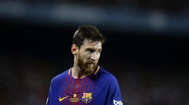 With his previous contract set to expire in 2018, Messi could have left Barca for free next summer had he not extended his deal. (Photo: AP)