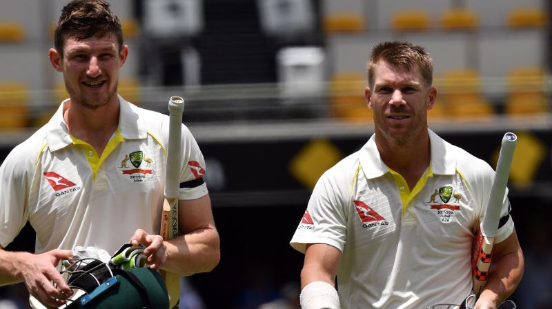 David Warner and newcomer Cameron Bancroft got the required runs in a 173-run opening stand to smash an 87-year-old record for the all-time highest unbeaten opening partnership in a successful Test chase. (Photo: AFP)