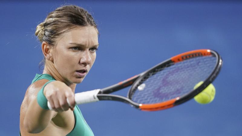 Halep has played in 15 tournaments so far in 2018, but she followed up her first major title by losing in the third round at Wimbledon. She then lost in the first round at the U.S. Open. (Photo: AP)