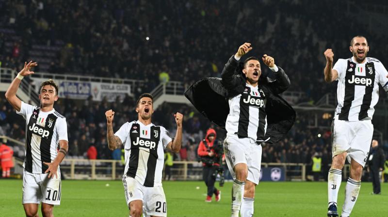 Ronaldo slotted in his 10th goal from 14 league games from the spot after 79 minutes, to add to Rodrigo Bentancurs opener after half an hour in Tuscany with captain Giorgio Chiellini volleying in after 69 minutes. (Photo: AP)