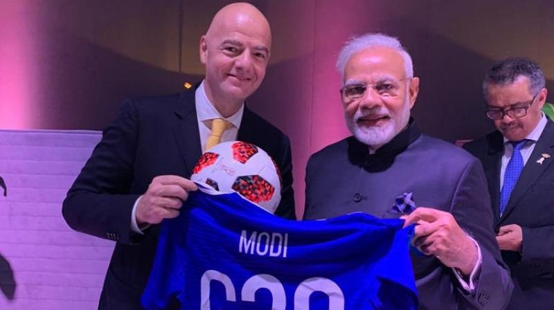 Modi, who met Infantino on the sidelines of the G-20 Summit in Buenos Aires on Saturday, shared a picture of the blue jersey, with his name on the back, on Twitter. (Photo: Twitter)