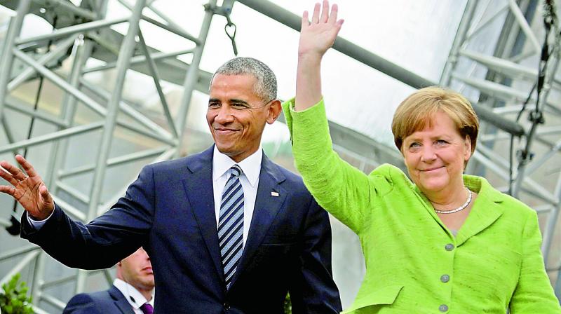 German Chancellor Angela Merkel and former US President Barack Obama
