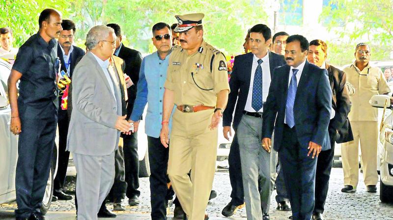 City police commissioner Anjani Kumar receives delegation led by Chief Election O O.P. Rawat in Hyderabad on Monday. (P.Surendra)