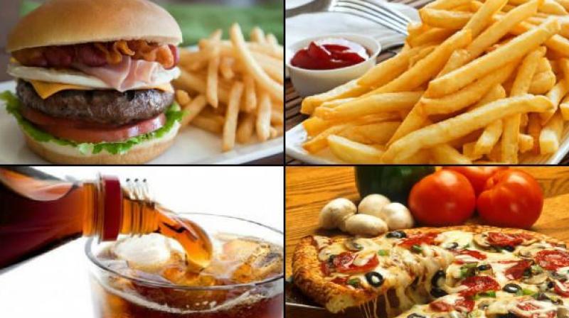 Industrially produced trans fats are found in fast food products like breads, doughnuts, biscuits, fried chicken, frozen dinners, pastries, cookies, pizza, ice creams (Representational image)