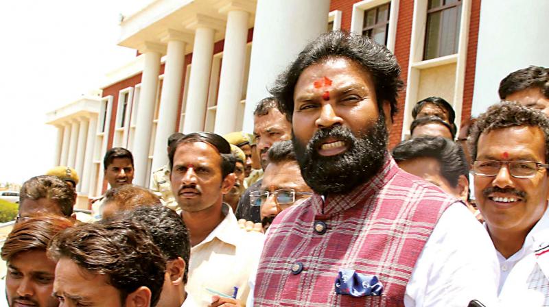 BJP candidate B. Sriramulu leaves a counting centre in Bagalkote on Tuesday  (Image: KPN)