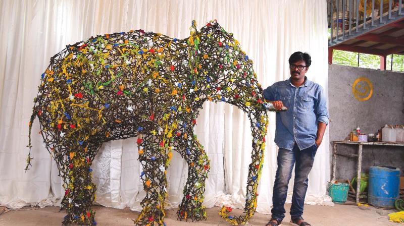 One of the participants Ajayan Kattungal with  his work.