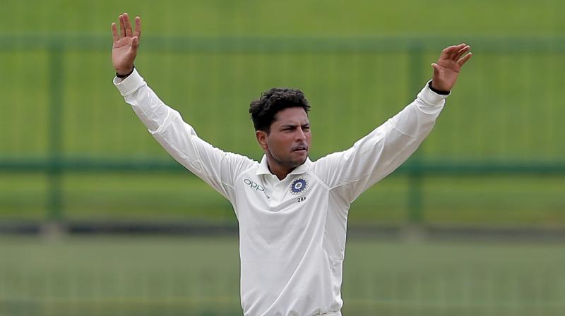 With Ravichandran Ashwin and Ravindra Jadeja plying their trade in English county circuit, young Kuldeep will lead the spin attack against Sri Lanka.  (Photo: AP)