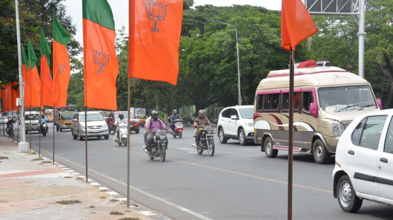 Flags greeting BJP national president Amit Shah  dotted the stretch from Chennai airport to VGP s golden beach resort on Monday. The flags in front of the metro rail at Alandur posed a hardship to  pedestrians. (Photo: DC)