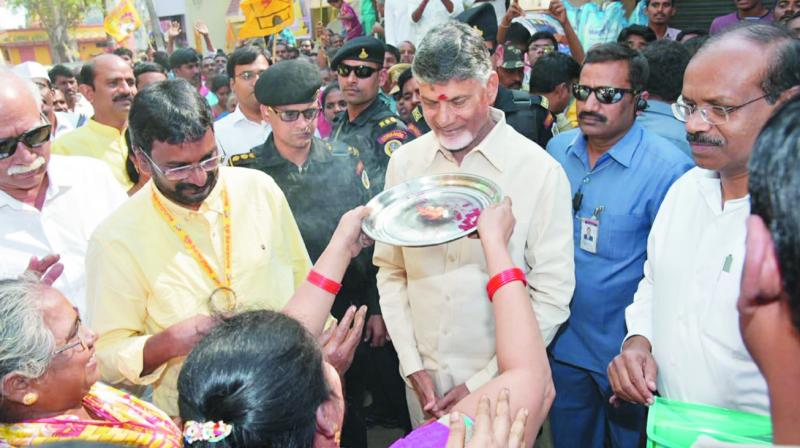 A woman welcomes Chief Minister N. Chandrababu Naidu during Janmabhoomi programme in Rajam on Saturday.  (DC)
