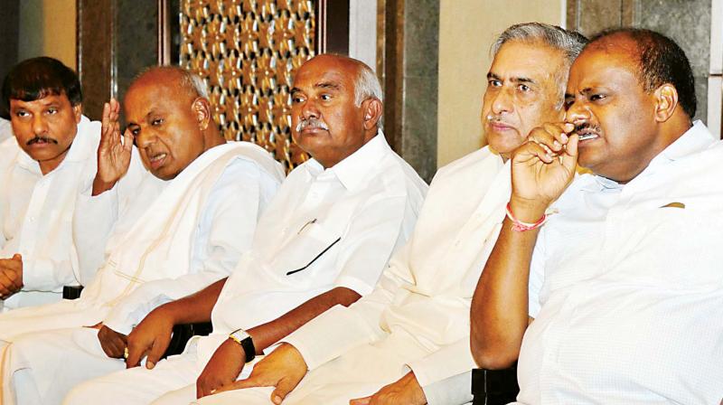 JD(S) leaders H.D. Deve Gowda, H.D. Kumaraswamy, A.H. Vishwanath and Basavaraj Horatti at party meeting in Bengaluru on Thursday 	 KPN