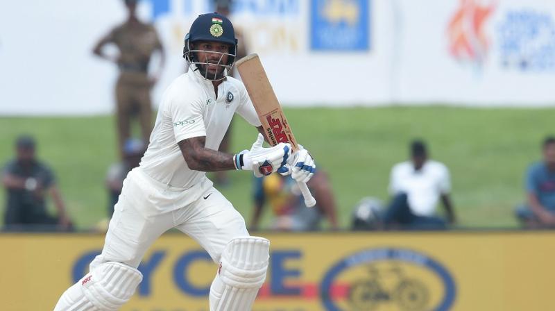 Senior opener Shikhar Dhawan appears to be a doubtful starter for the first Test against South Africa, starting January 5, due to an ankle injury.(Photo: AFP)