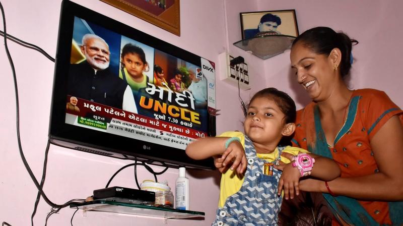 Four-year-old girl Nennsi who broke from the crowd and came forward to greet Prime Minister Narendra Modi. (Photo: PTI)